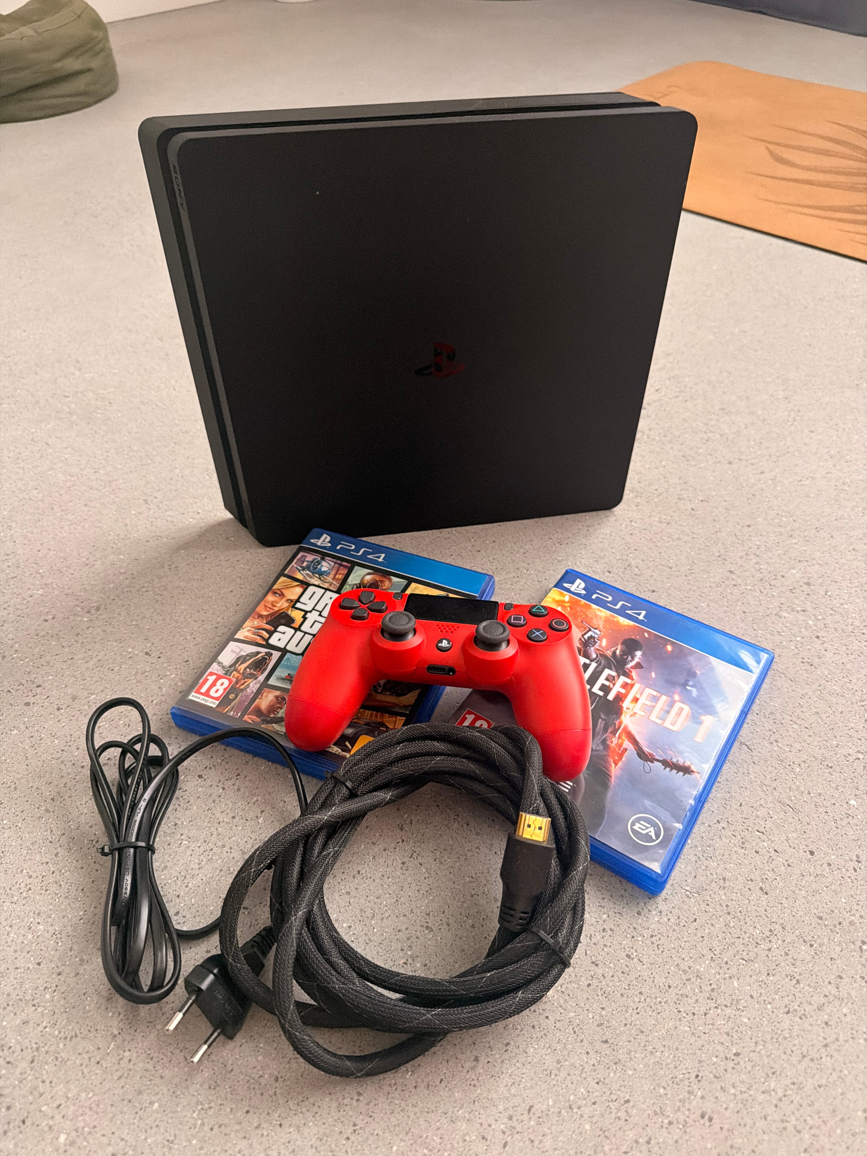 PlayStation 4 (PS4) mit 1 Controller, 2 Spielen und HDMI-Kabel