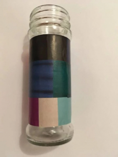 Glasvase mit Collage