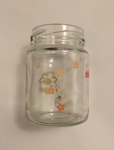 Glasvase mit farbigen Blumen