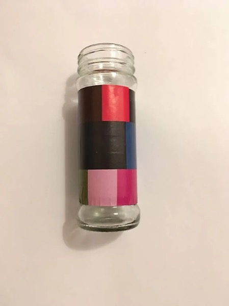 Glasvase mit Collage