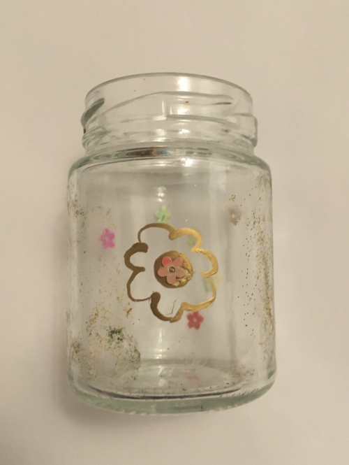 Glasvase mit farbigen Blumen