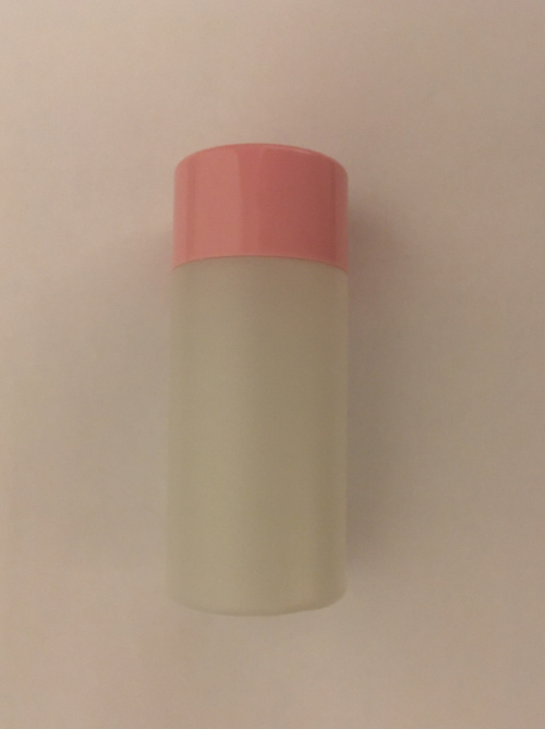 Durchsichtige leere Dose mit rosa Deckel